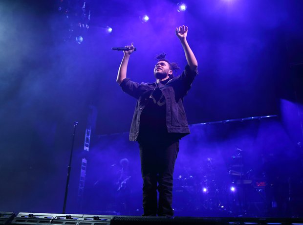 The Weeknd performs on stage at O2 Arena