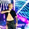 Image 4: Justin Bieber shows off his abs on stage 